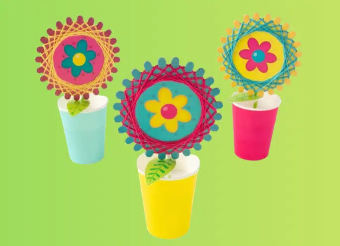 Colorful string art flowers in pots.