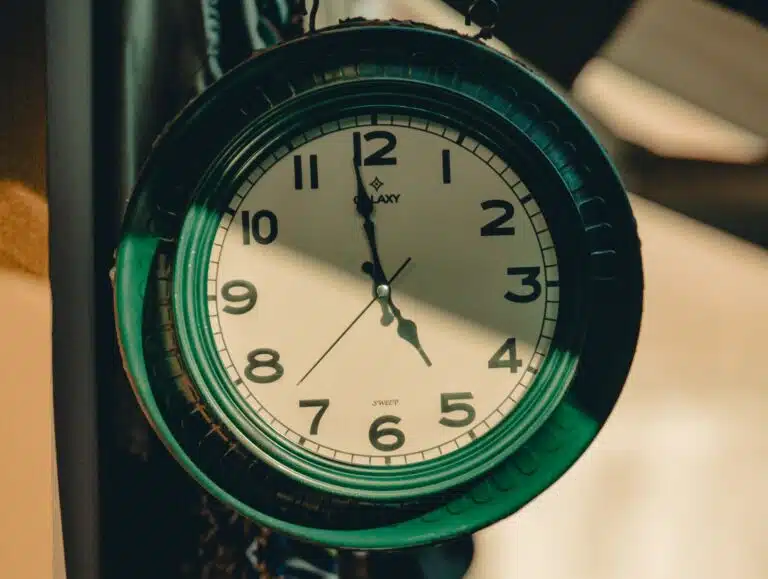 Clock face showing 5 o'clock.
